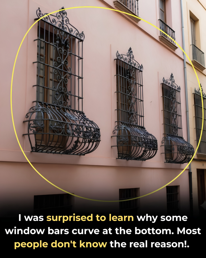 Why are some window bars curved at the bottom